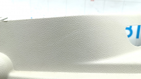 Left arch trim Lincoln MKC 15 - beige with dark gray, under subwoofer, scratches, broken fasteners, needs cleaning