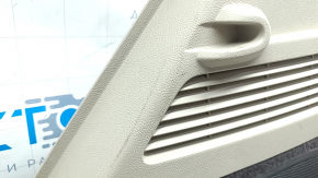 Left arch trim Lincoln MKC 15 - beige with dark gray, under subwoofer, scratches, broken fasteners, needs cleaning