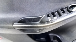 Door trim card front left Ford Focus mk3 15-18 black with black insert cloth, scratches, abrasions, peeling coating on the handle