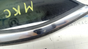 Window blind glass rear left Lincoln MKC 15 - scratches on chrome, cut seal