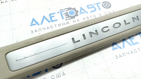 Door sill trim front left Lincoln MKC 15- beige with backlight, scuffed, scratches