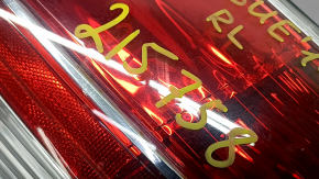 Light outer wing left Nissan Rogue 14-16 chip on glass, scuffed, crack