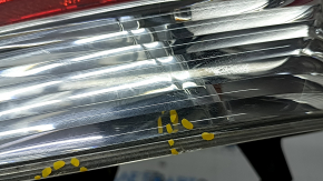 Light outer wing left Nissan Rogue 14-16 chip on glass, scuffed, crack