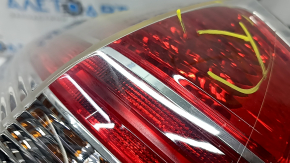 Light outer wing left Nissan Rogue 14-16 chip on glass, scuffed, crack