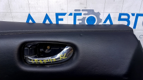 Door trim card front left Nissan Leaf 13-17 black with black insert leather, armrest black leather, scratches, bumps, dents, abrasions