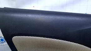 Door trim card front left Nissan Versa Note 13-19 black with beige insert cloth, armrest black plastic, scratches, abrasions