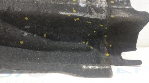 The rear left underbody protection of Audi A6 C7 12-18 is torn and worn