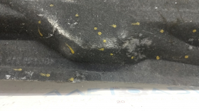 The rear left underbody protection of Audi A6 C7 12-18 is torn and worn