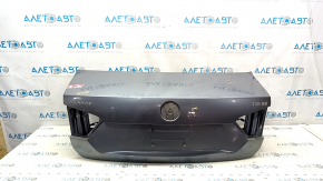 Trunk lid VW Passat b7 12-15 USA graphite LD7X bumps, scratches