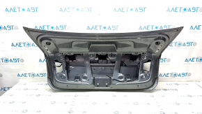 Trunk lid VW Passat b7 12-15 USA graphite LD7X bumps, scratches