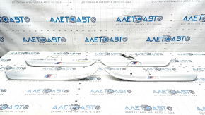 Set of external door sill trims BMW 7 G12 16-22 "M" inscription, dents, scratches, bumps, torn cable, broken fasteners Used