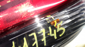 Light outer wing left Nissan Rogue 17- scratches, chip cut off, no fragment