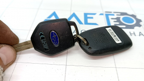 Subaru Forester 19-SK 4-button key with 1-button key fob, scratches, used