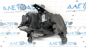Headlight front left complete Jeep Grand Cherokee WK2 16-18 xenon, dark, without washer, sand, plaque from inside glass used
