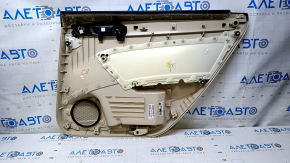 Door trim card rear left VW Passat b7 12-15 USA beige with beige insert leather, armrest beige leather, molding gray gloss, with tweeter, without backlight, dents, scratches, abrasions, break fastenin