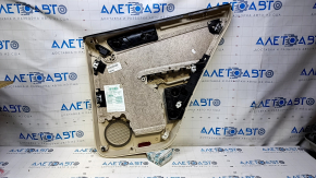 Door trim card rear left VW Tiguan 09-17 beige with beige insert leather, armrest beige leather, with squeaker, scratches, abrasions, whitened plastic