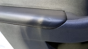 Door trim card rear left VW Jetta 11-18 USA black with black insert plastic, armrest black leather, molding gray gloss type 1 scratches, abrasions, bumps
