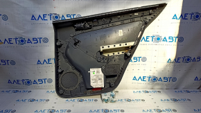 Door trim card rear left VW Jetta 11-18 USA black with black insert plastic, armrest black leather, molding gray gloss type 1 scratches, abrasions, bumps