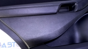 Door trim card rear left Ford Edge 15-18 black with black insert cloth, armrest black leather, scratches, abrasions, dent