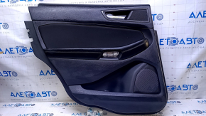 Door trim card rear left Ford Edge 15-18 black with black insert cloth, armrest black leather, scuffs, abrasions, dent