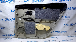 Door trim card rear left Toyota Prius V 12-17 beige with beb insert cloth, armrest beige cloth, scuffs, scratches