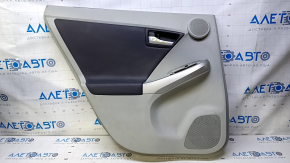 Door trim card rear left Toyota Prius 30 10-15 gray with dark insert leather, armrest dark gray leather, molding gray structure, under the tweeter, scratches, abrasions, broken fasteners