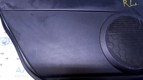Door trim card rear left Mazda CX-7 06-09 black with black insert plastic, armrest black plastic, scratches, abrasions