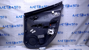Door trim card rear left Nissan Leaf 13-17 black with black insert plastic, armrest black leather, scuffs, scratches, abrasions