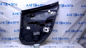 Door trim card rear left Nissan Leaf 13-17 black with black insert plastic, armrest black leather, bumps, scratches, abrasions, worn leather