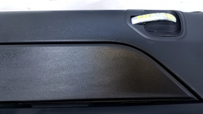 Door trim card rear left Jeep Patriot 11-17 black with black insert plastic, armrest black plastic, scratches, abrasions, broken fastener