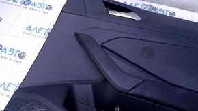 Door trim card rear right VW Jetta 19 - black with black plastic insert, armrest black leather, under the tweeter, scratches, abrasions, dent