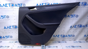 Door trim card rear right VW Jetta 11-18 USA black with black insert plastic, armrest black leather, molding black matte, type 1, scratches, abrasions
