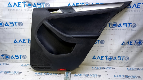 Door trim card rear right VW Jetta 11-18 USA black with black insert plastic, armrest black leather, molding gray gloss type 1, scuffs, broken fastening