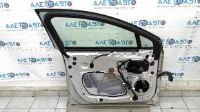 Door assembly front left Ford Fusion mk5 13-20 hybrid, silver UX, dent, no door handle plug, cracks in trim, scratches on molding