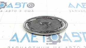 Emblem badge KIA front bumper Kia Niro 17-21 sand, varnish swelled
