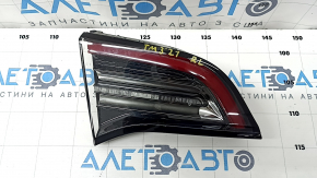 Light inside trunk lid left Tesla Model 3 18-type 2, dirty inside