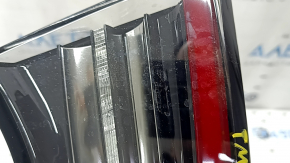 Light inside trunk lid left Tesla Model 3 18-type 2, dirty inside