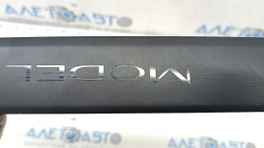 Door sill trim front left outer Tesla Model 3 18 - black, scratches, varnish swelled