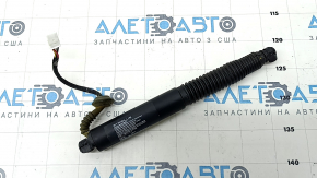 Left trunk lid shock absorber Tesla Model 3 18- electric, corner broken, boot torn