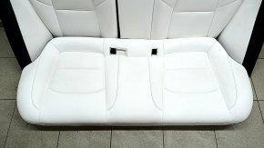 Back row of seats 2nd row Tesla Model 3 18 - white leather, heated, dented leather, needs cleaning