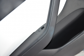 Door trim card rear left Tesla Model Y 20- leather black with white type 2, with speaker, with suede insert, with window lift control, with door opening button