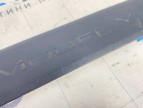 Door sill trim front left outer Tesla Model Y 20 - black, scratches