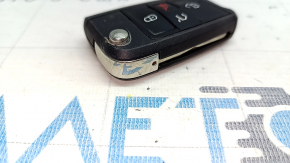 VW Jetta 19 key - 4 buttons, folding, worn