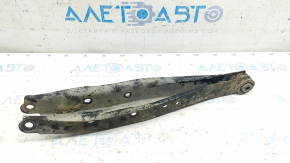 Rusty lower rear right control arm for a Subaru Impreza WRX GH 08-14