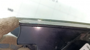 The outer wing light, left Tesla Model S 12-20, is worn, the glass has come off