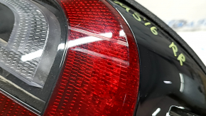 The outer wing light right Tesla Model S 12-20 is worn, the glass has come off