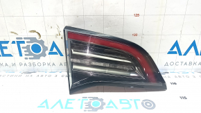 Light inside trunk lid left Tesla Model 3 18- type 2 scratches 