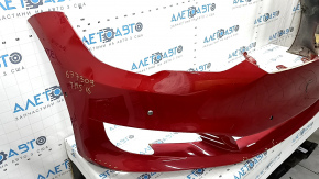 Front bare bumper Tesla Model S 16-20 rest, assembled, red, for 6 parking sensors, with eyelets, wiring, turn signals and radiator grille, cracked mount, scratches, sand, part of the emblem is missing