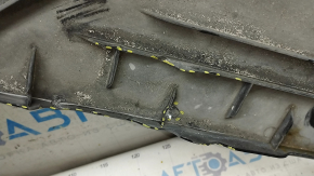 The rear left underbody protection of the BMW 5 G30 18- 530e hybrid is torn, rubbed, pressed