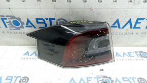 The outer wing light, left Tesla Model S 12-20, is worn, the glass has come off